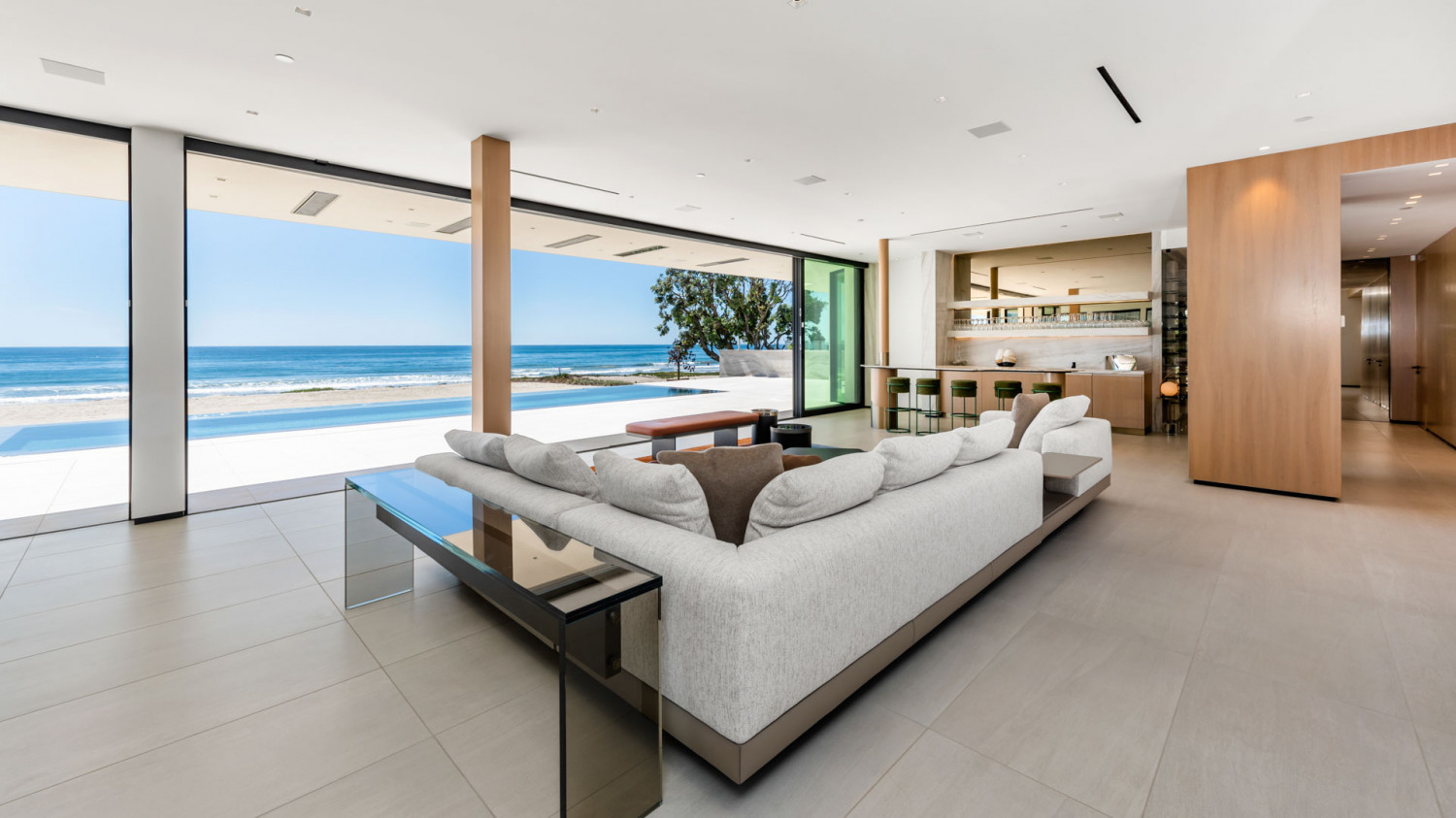 Malibu beachfront estate living room with floor to ceiling ocean views